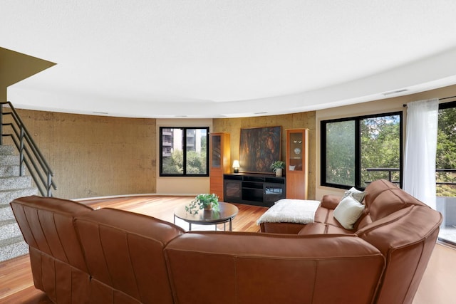 living room with light hardwood / wood-style flooring