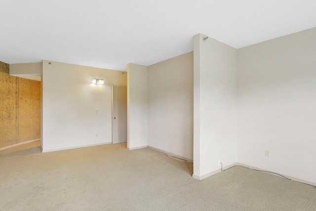 empty room featuring carpet flooring