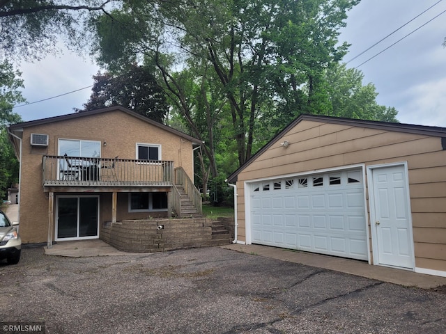 garage featuring wood walls