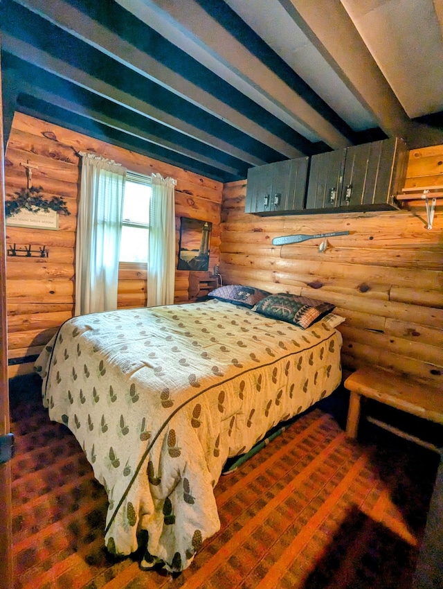 bedroom featuring log walls and beamed ceiling