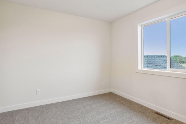 view of carpeted spare room