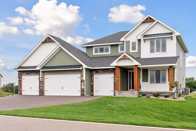 craftsman-style home featuring covered porch, central AC, and a front lawn