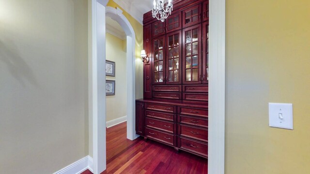 hall with dark hardwood / wood-style floors