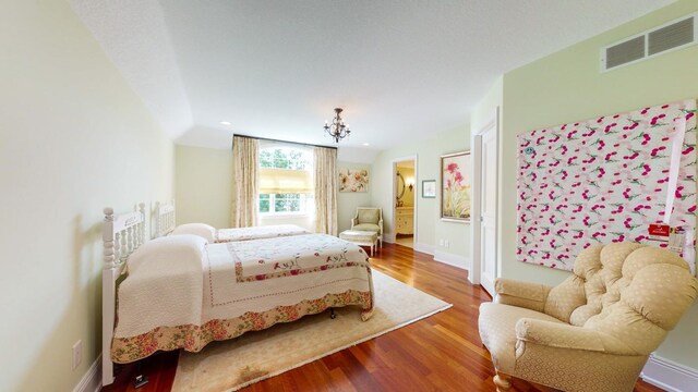 bedroom featuring wood-type flooring