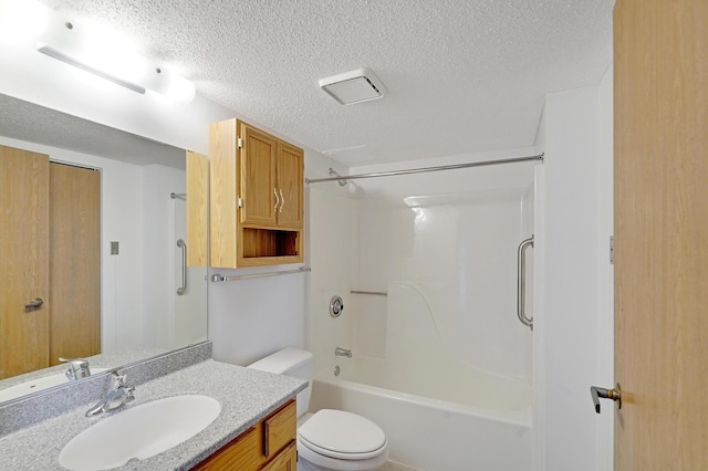 full bathroom featuring shower / bath combination, toilet, a textured ceiling, and vanity