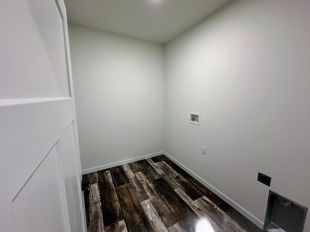 laundry area with laundry area, dark wood-style flooring, baseboards, and hookup for a washing machine