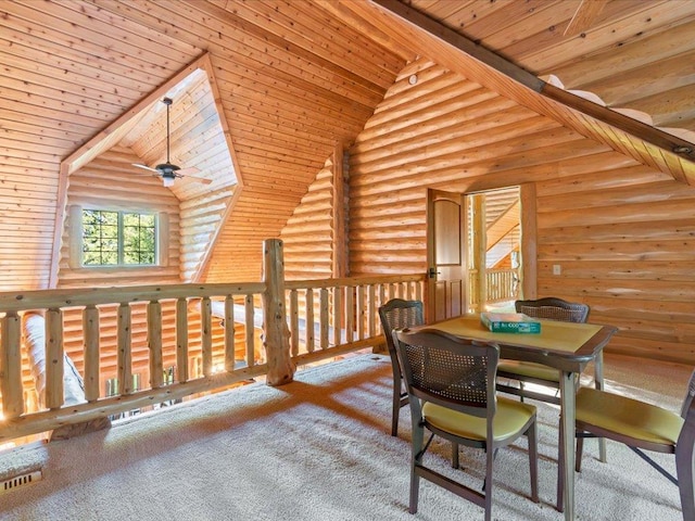 dining space featuring high vaulted ceiling, log walls, ceiling fan, and wood ceiling