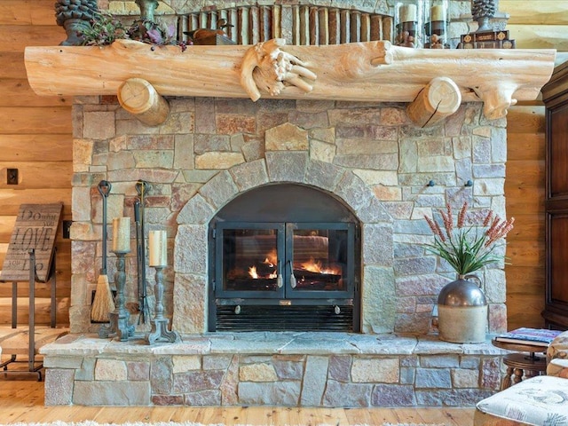 room details with log walls and a fireplace