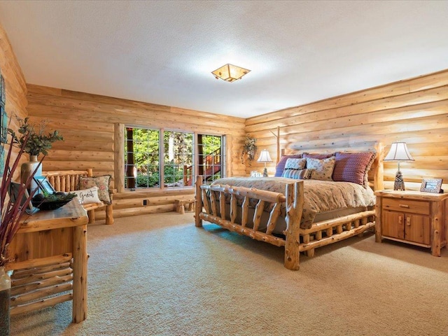 bedroom featuring rustic walls and carpet flooring