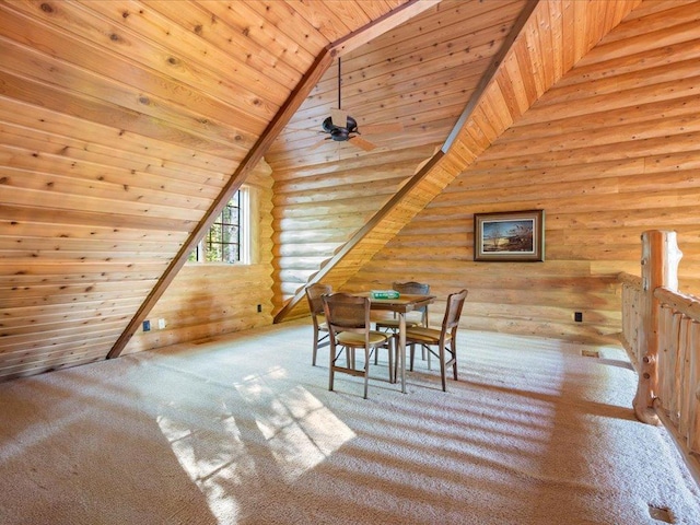 dining space with lofted ceiling, log walls, ceiling fan, light carpet, and wooden ceiling