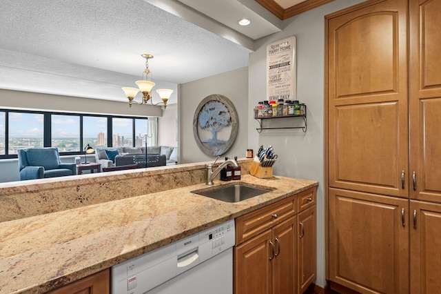 kitchen with dishwasher, a chandelier, sink, decorative light fixtures, and light stone countertops