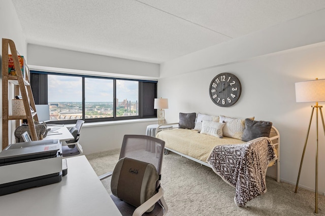 carpeted bedroom featuring a textured ceiling and baseboards