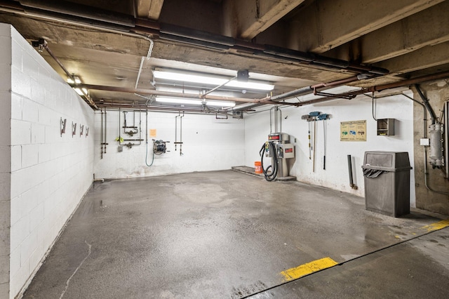 garage featuring concrete block wall