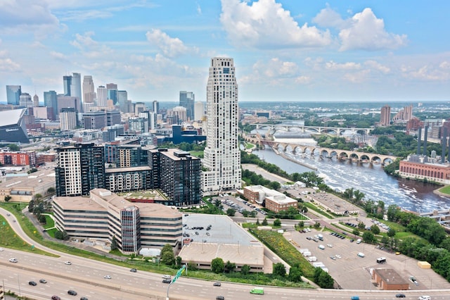 aerial view featuring a view of city and a water view