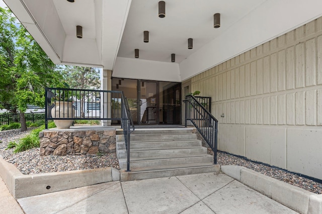 property entrance with fence