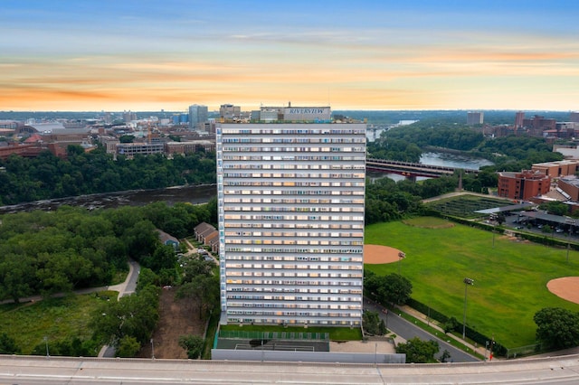 aerial view at dusk with a water view