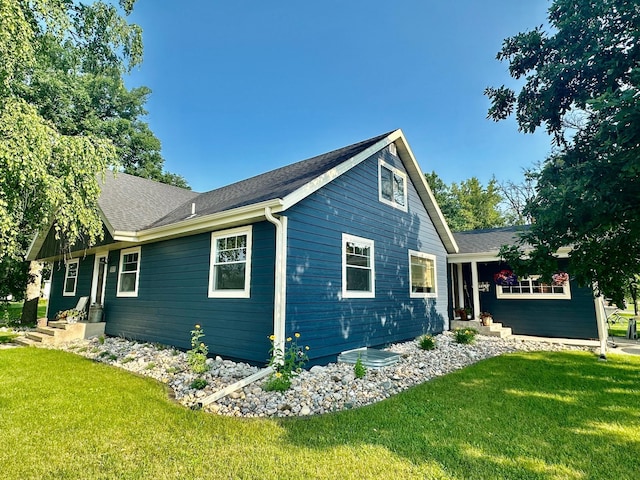 view of home's exterior featuring a lawn