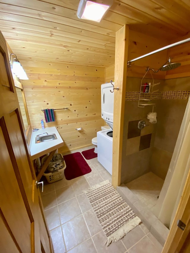 bathroom featuring tile patterned flooring, toilet, and wooden ceiling