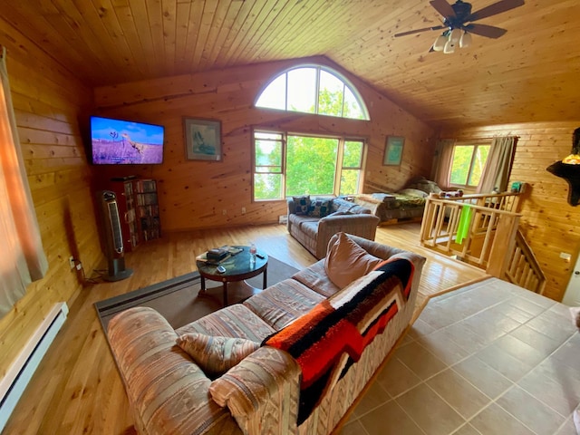 living room with a baseboard radiator, hardwood / wood-style floors, vaulted ceiling, and wood ceiling