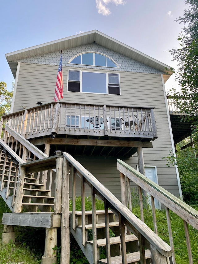 rear view of property with a deck