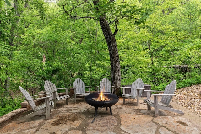 view of patio / terrace featuring a fire pit