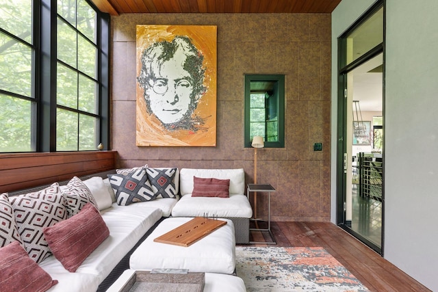 sunroom / solarium featuring wooden ceiling