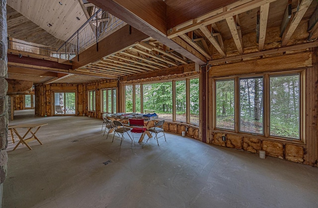 unfurnished sunroom featuring a wealth of natural light