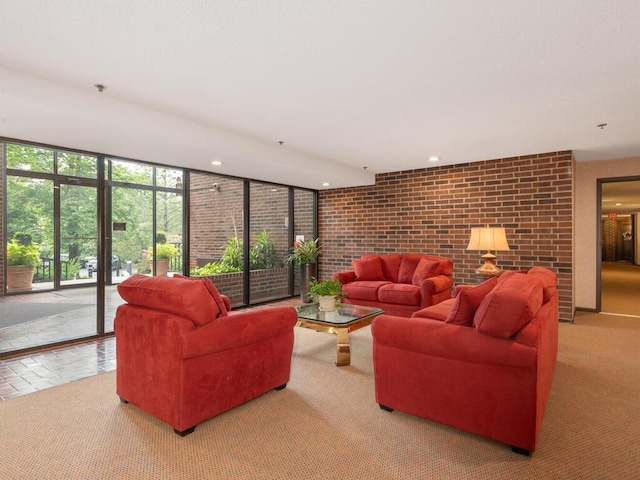 living room with light colored carpet and brick wall