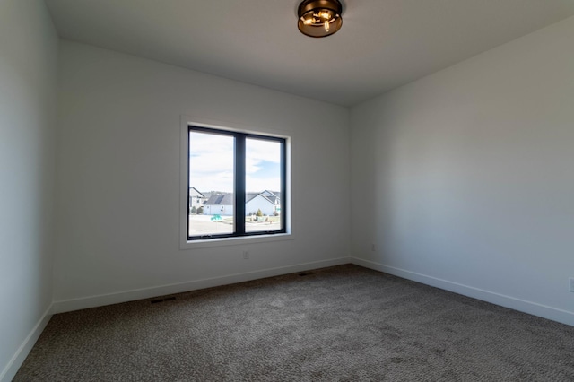 view of carpeted spare room