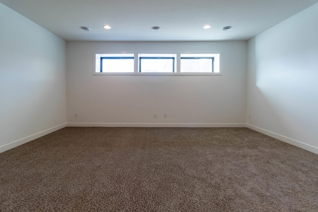 3180 Bella Terra Ln NE, Rochester, MN 55906 - spare room featuring carpet flooring, baseboards, and recessed lighting