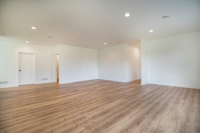 unfurnished room featuring light wood-type flooring