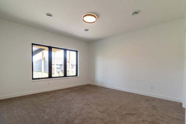 empty room featuring carpet floors