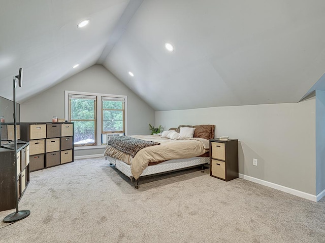 bedroom featuring vaulted ceiling and light carpet