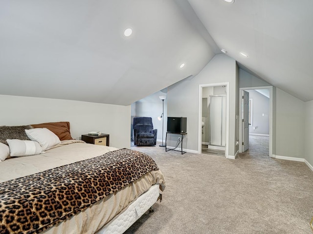 carpeted bedroom with vaulted ceiling