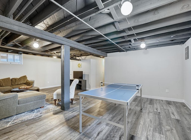 recreation room featuring wood-type flooring