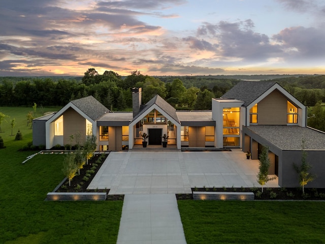 view of front of home with a yard