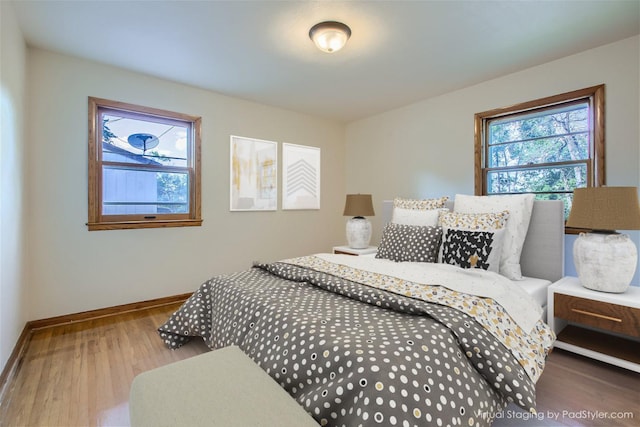 bedroom with wood-type flooring