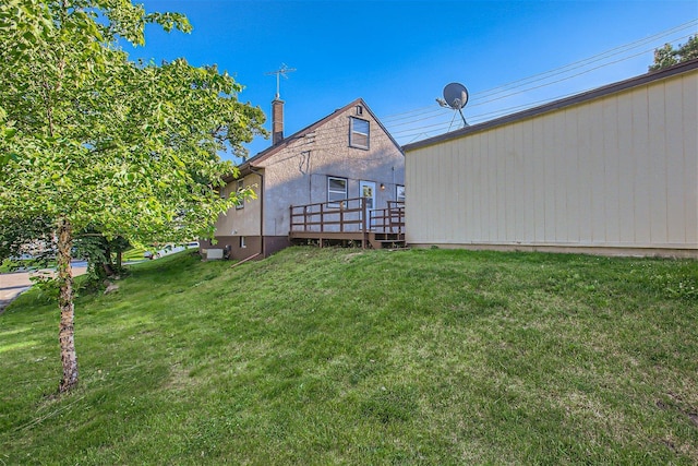 view of yard with a deck