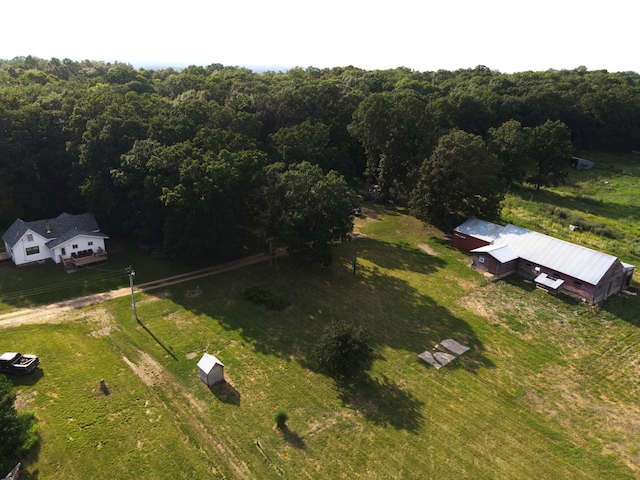 aerial view with a forest view and a rural view