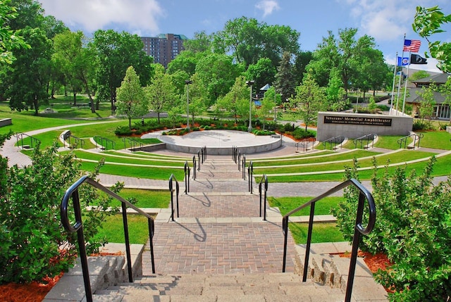 view of home's community with a lawn