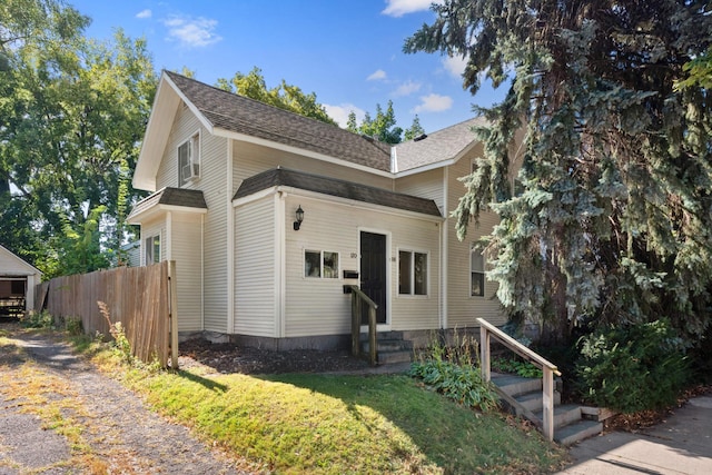 view of front of property with a front lawn