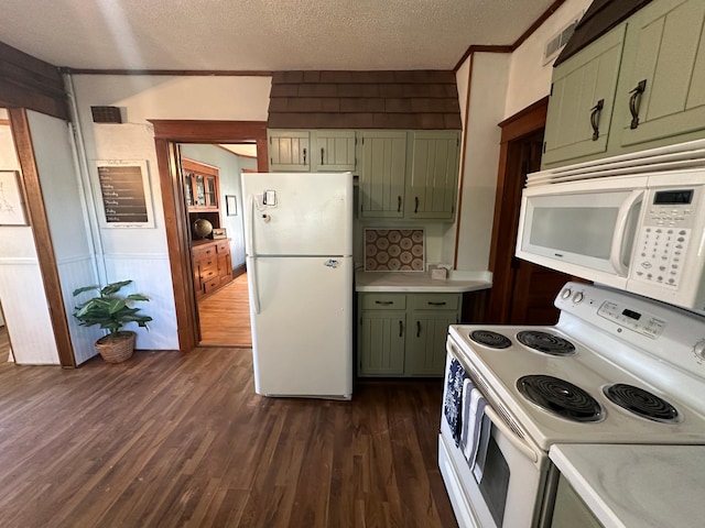 kitchen featuring green cabinets, light countertops, white appliances, and a textured ceiling