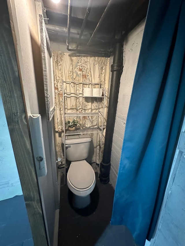 bathroom featuring toilet