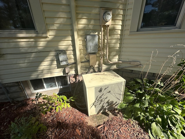 exterior details featuring electric meter