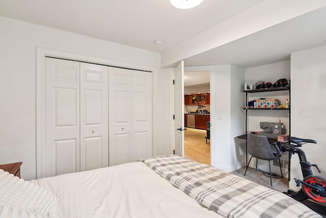 carpeted bedroom with a closet