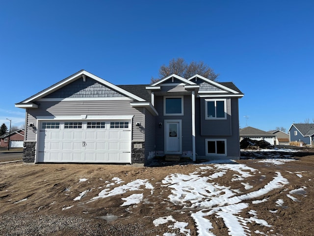 view of front of property featuring a garage