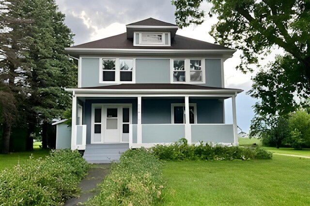 view of front of home featuring a front lawn