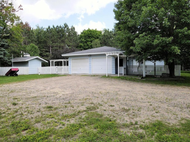 view of yard with an outdoor structure and a garage