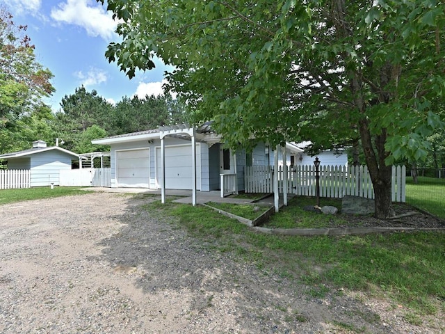20761 Moose Point Rd, Grand Rapids, MN 55744 - view of front of house with fence private yard and driveway