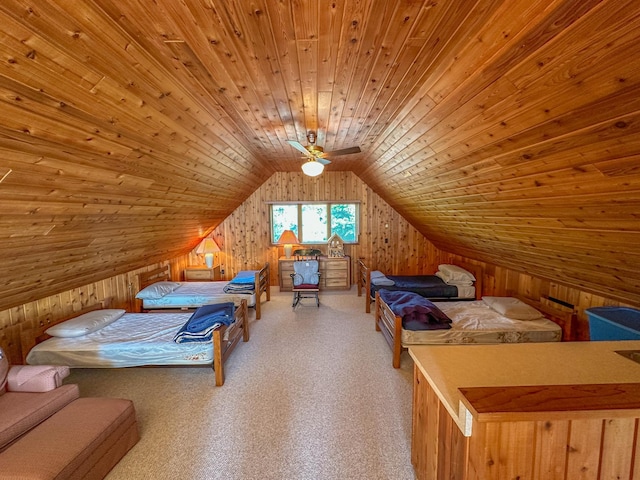 unfurnished bedroom featuring wooden walls, lofted ceiling, carpet flooring, and wood ceiling